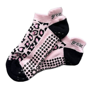 Kiera in fashionable pink and black tab back non-slip grip sport sock wear for pilates, barre, walking or a hospital stay